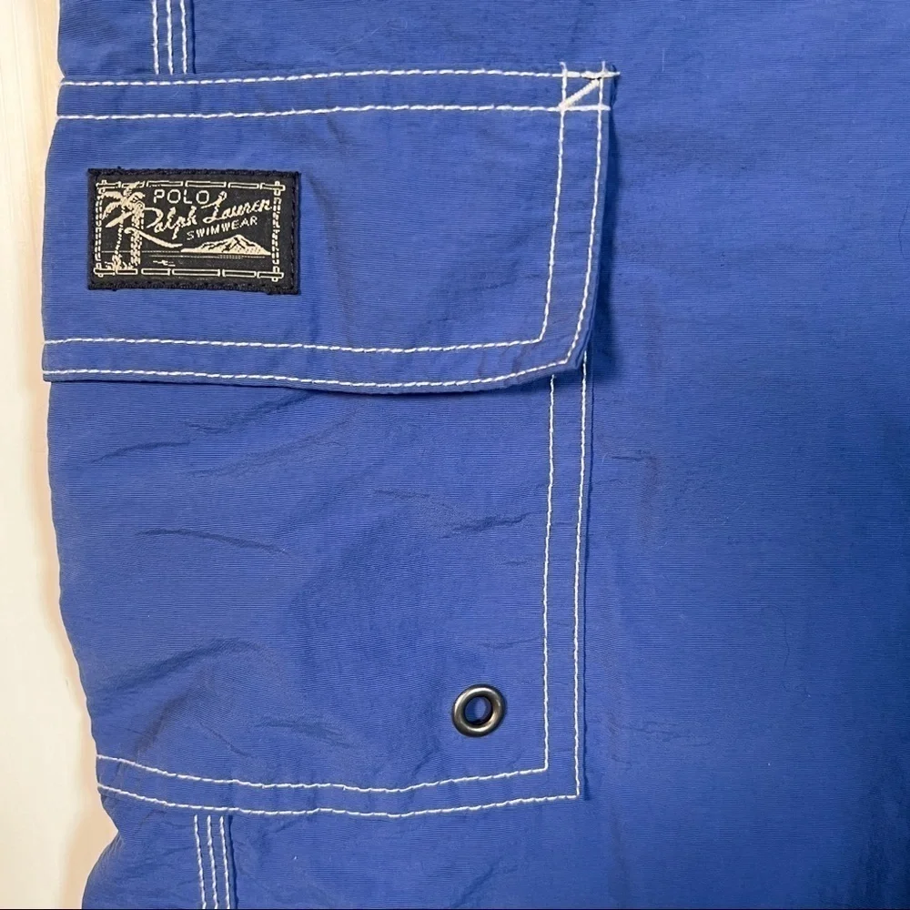 POLO RALPH LAUREN Swimwear. Blue w/cargo pocket, side pockets & key pocket. M